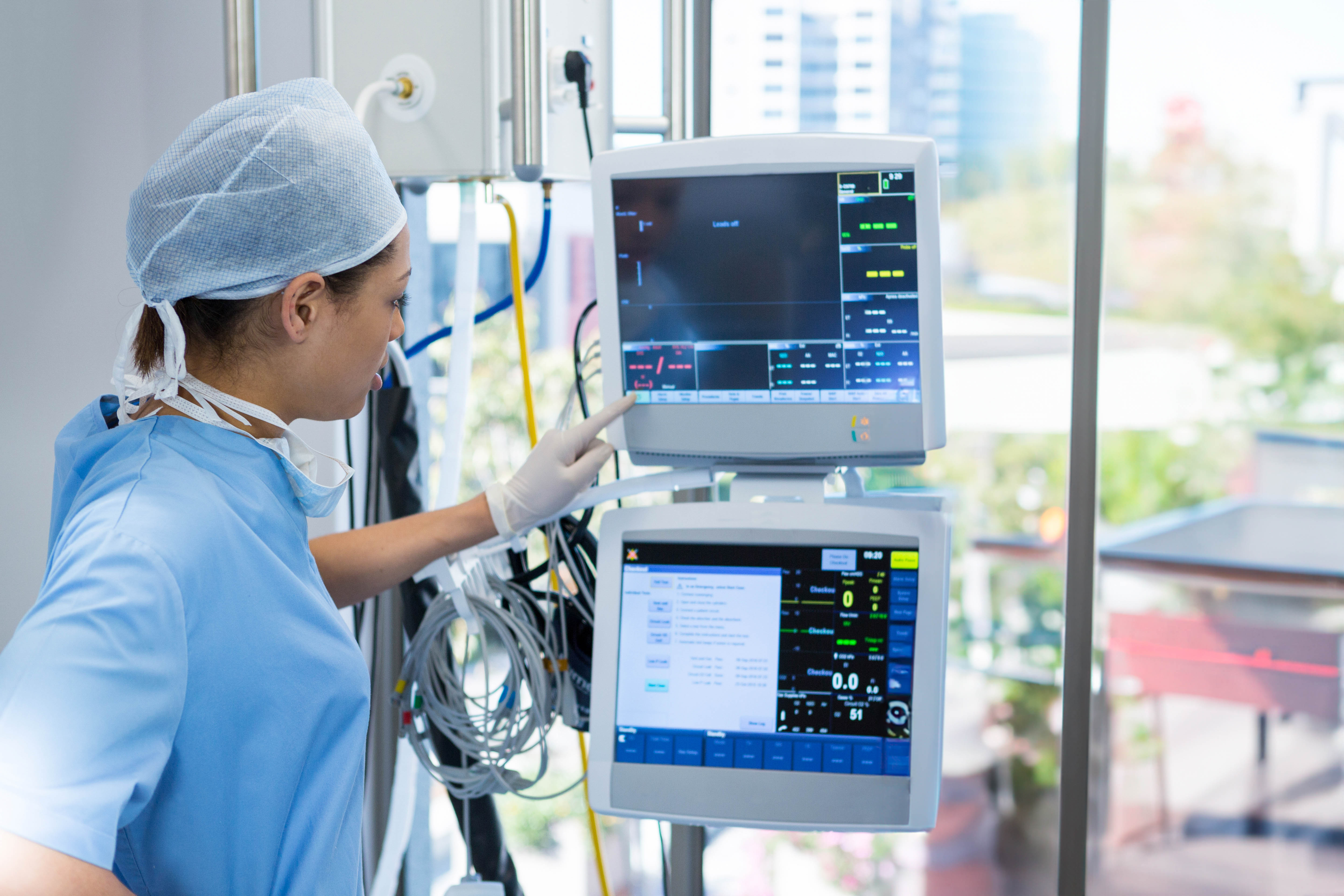 Hospital clinician consulting with a patient in a facility implementing DNV DIAS international accreditation standards