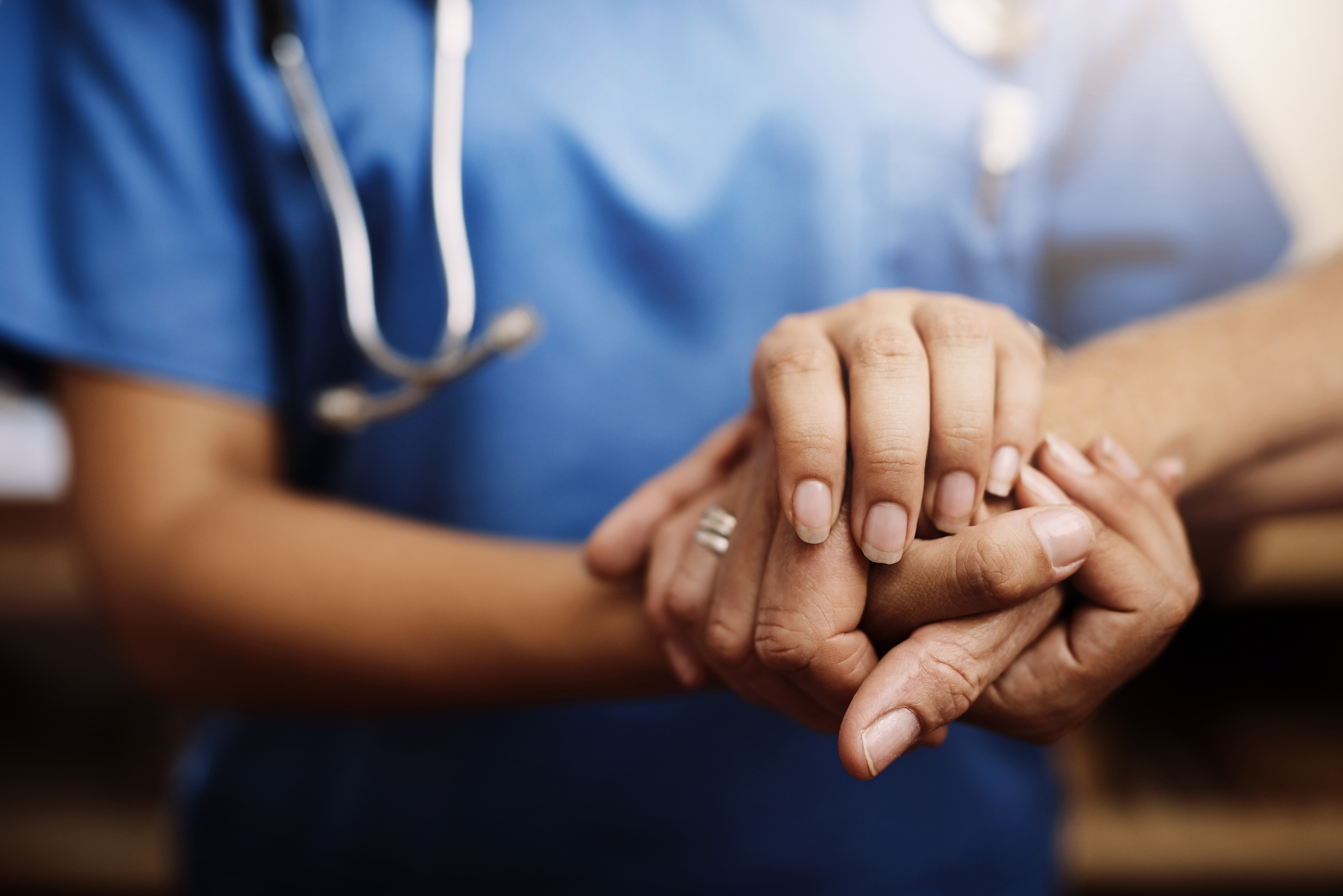 Healthcare professionals discussing stroke test results with a patient, highlighting rapid evaluation and evidence-based treatment decisions